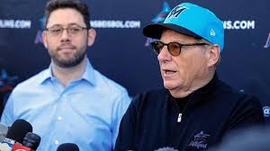 Peter Bendix DOB y Bruce Sherman CEO de los Marlins